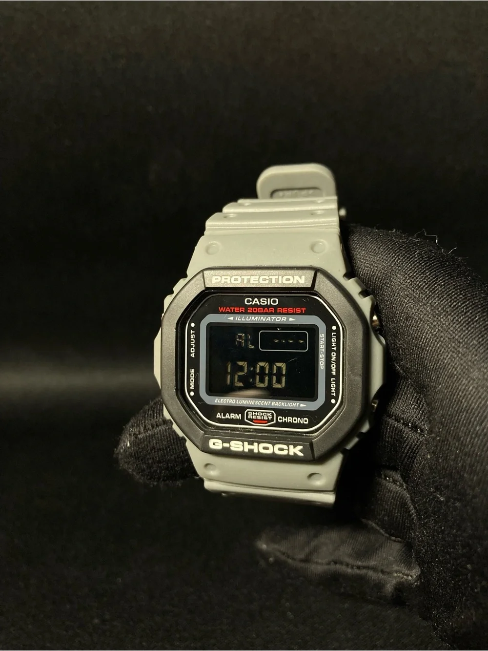 Grey and Red G Shock Dw5600